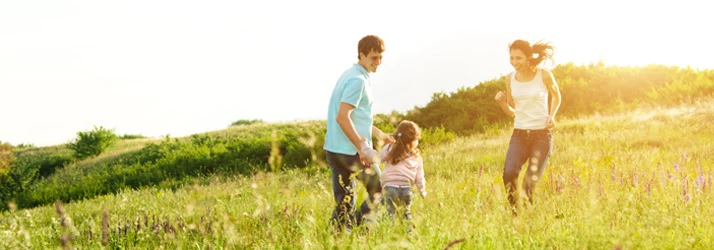 Chiropractic Clarkesville GA Happy Family in Field